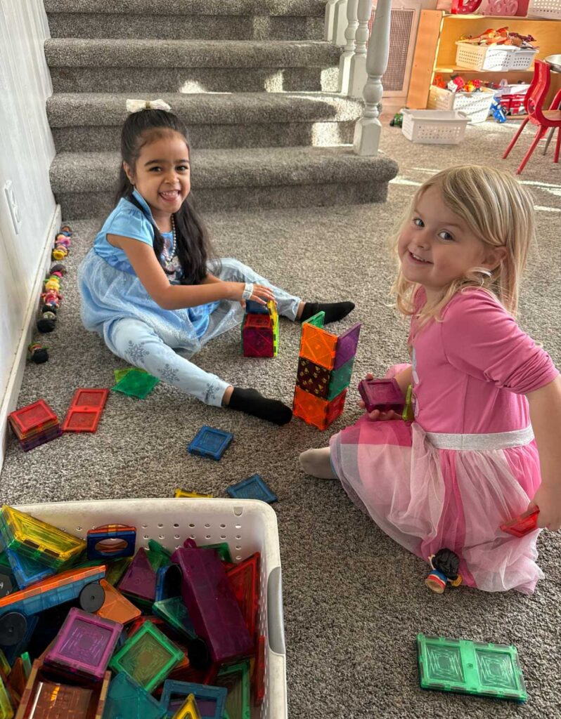 two girls playing with magna-tiles at Yellow Brick Road Preschool in Napa