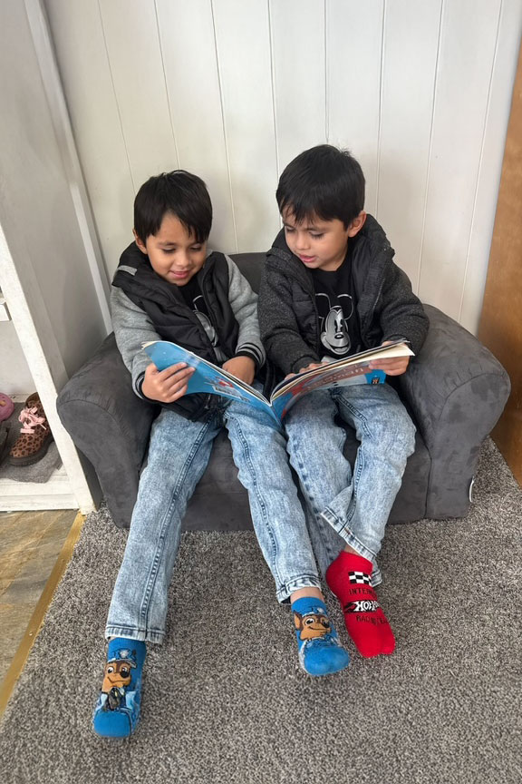 Boys reading at Yellow Brick Road Preschool in Napa